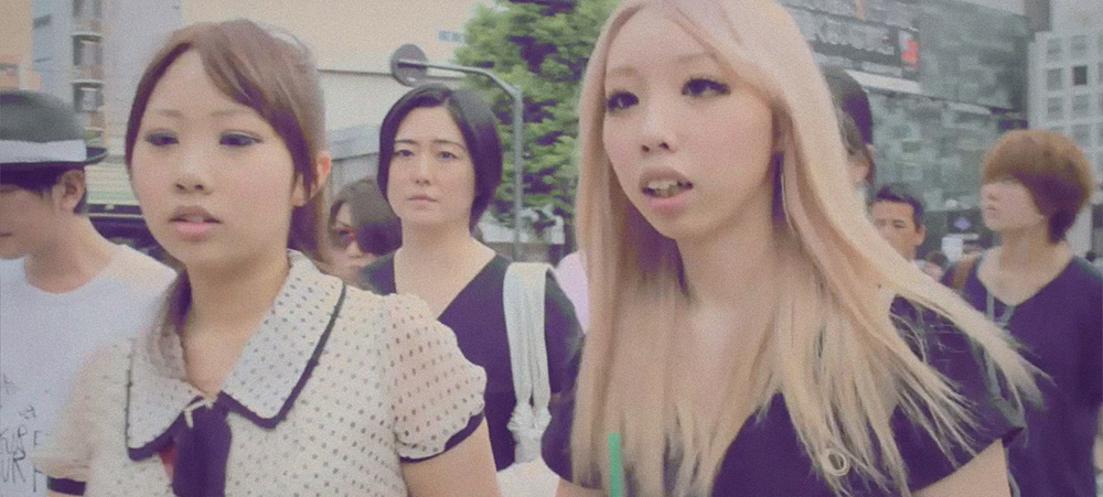 Women being interviewed on the Shibuya Crossing