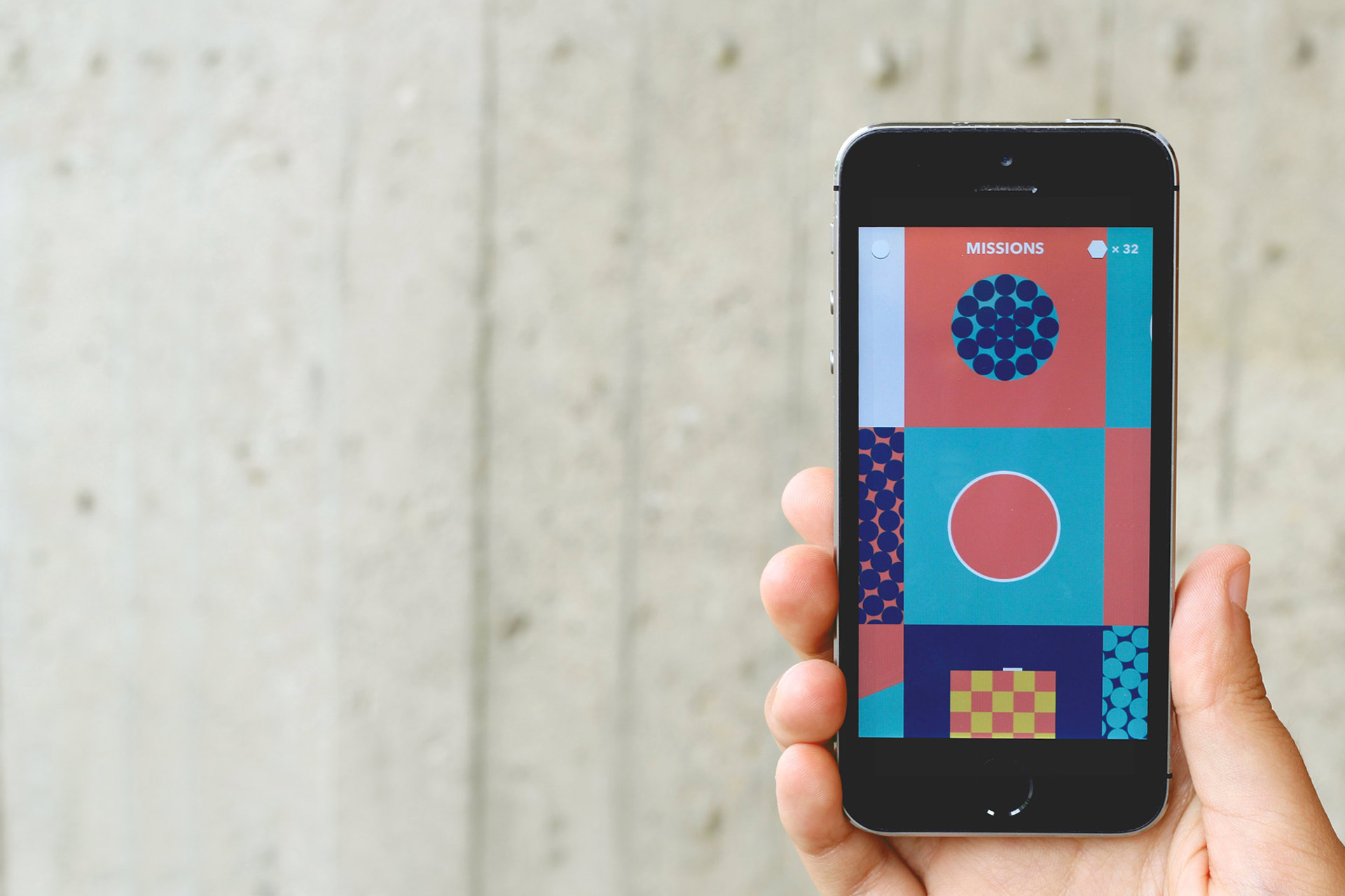 A Hand holding a phone with the Cucalu mission screen